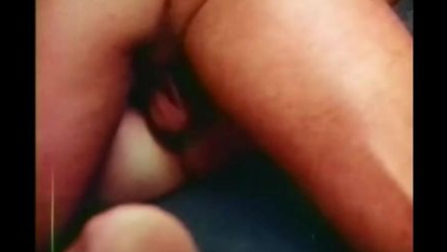 Watch Gina Russell & Andrea True get down and dirty in vintage sex tape!